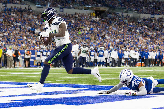 Seattle Seahawks receiver DK Metcalf reels in a deep ball from quarterback Geno Smith to find the endzone vs. the Indianapolis Colts (2021).